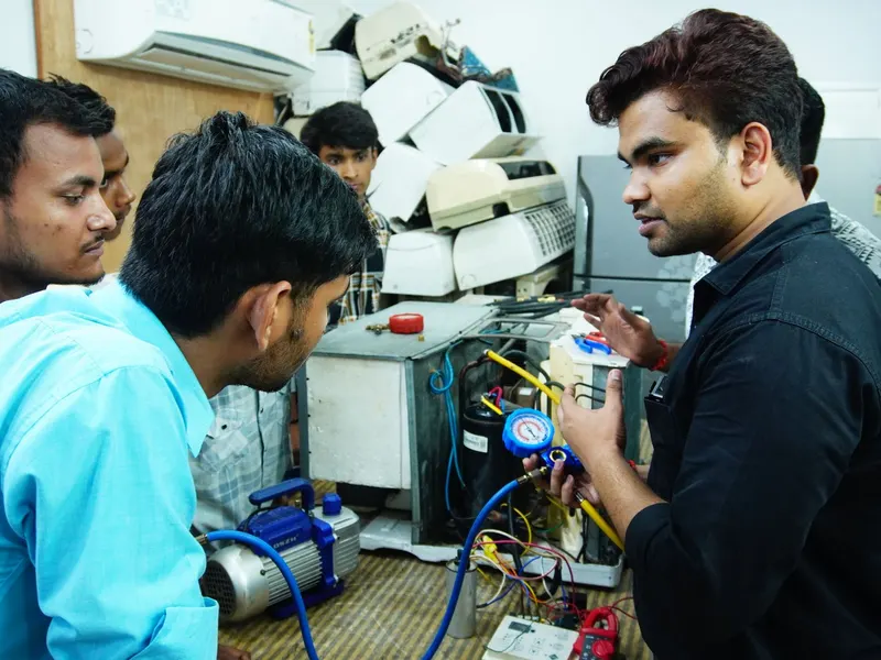 Technician repairing a home appliance