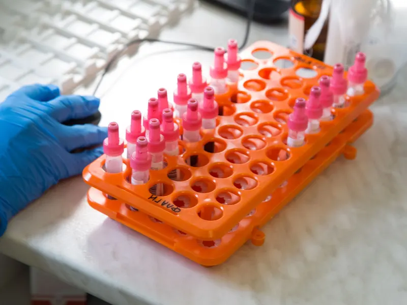 Technician collecting environmental samples